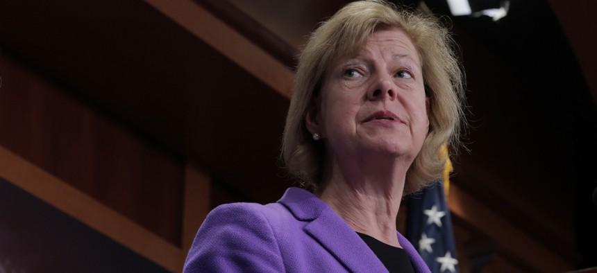 U.S. Sen. Tammy Baldwin (D-WI) speaks during a news conference on Senate Republican’s Budget Resolution legislation at the U.S. Capitol on April 03, 2025 in Washington, DC. Baldwin led a letter May 7 calling for HHS to explain planned cuts to the suicide lifeline's LGBTQ+ youth program.