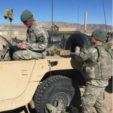 780th Military Intelligence Brigade conduct cyberspace operations during a training rotation for the 2nd Stryker Brigade Combat Team, 2nd Infantry Division, at the National Training Center at Fort Irwin, Calif., Jan. 24. 2016; (Photo Credit: U.S. Army photo)