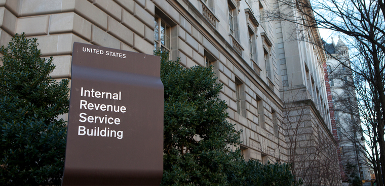 Shutterstock photo ID: photo ID: 245503636 By Mark Van Scyoc Sign outside the Internal Revenue Service building in downtown Washington, DC on December 26, 2014.