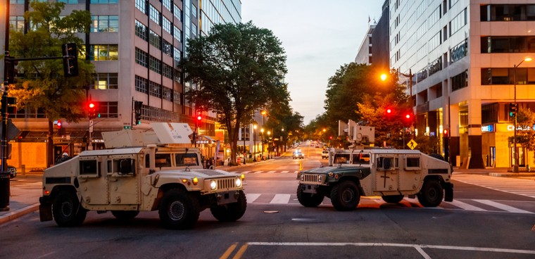 Shutterstock ID: 1747732994 By bgrocker Military vehicles were parked near White house. Many protesters gathered around in front of White House in Washington DC on 6/1/2020.
