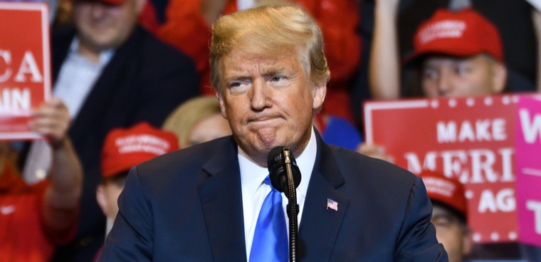 WILKES-BARRE, PA - AUGUST 2, 2018: Donald Trump, President of the United States pauses with a concerned expression while delivering a speech at a campaign rally held at the Mohegan Sun Arena. Editorial credit: Evan El-Amin / Shutterstock.com image number 1515374468