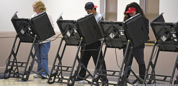 people voting (Gino Santa Maria/Shutterstock.com)