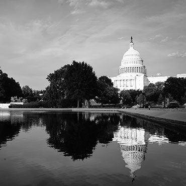 Shutterstock image: U.S. Capitol reflection in black and white.
