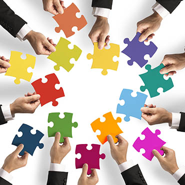 Shutterstock image: cooperation, pieces to the puzzle.