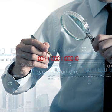 Shutterstock image: examining a line of code.