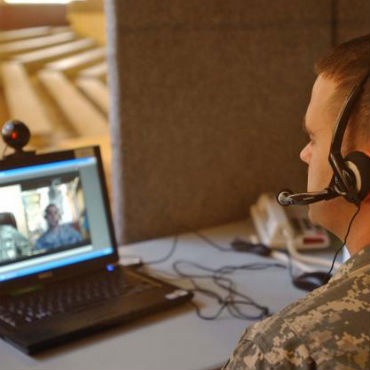 Soldier using Defense Connect Online